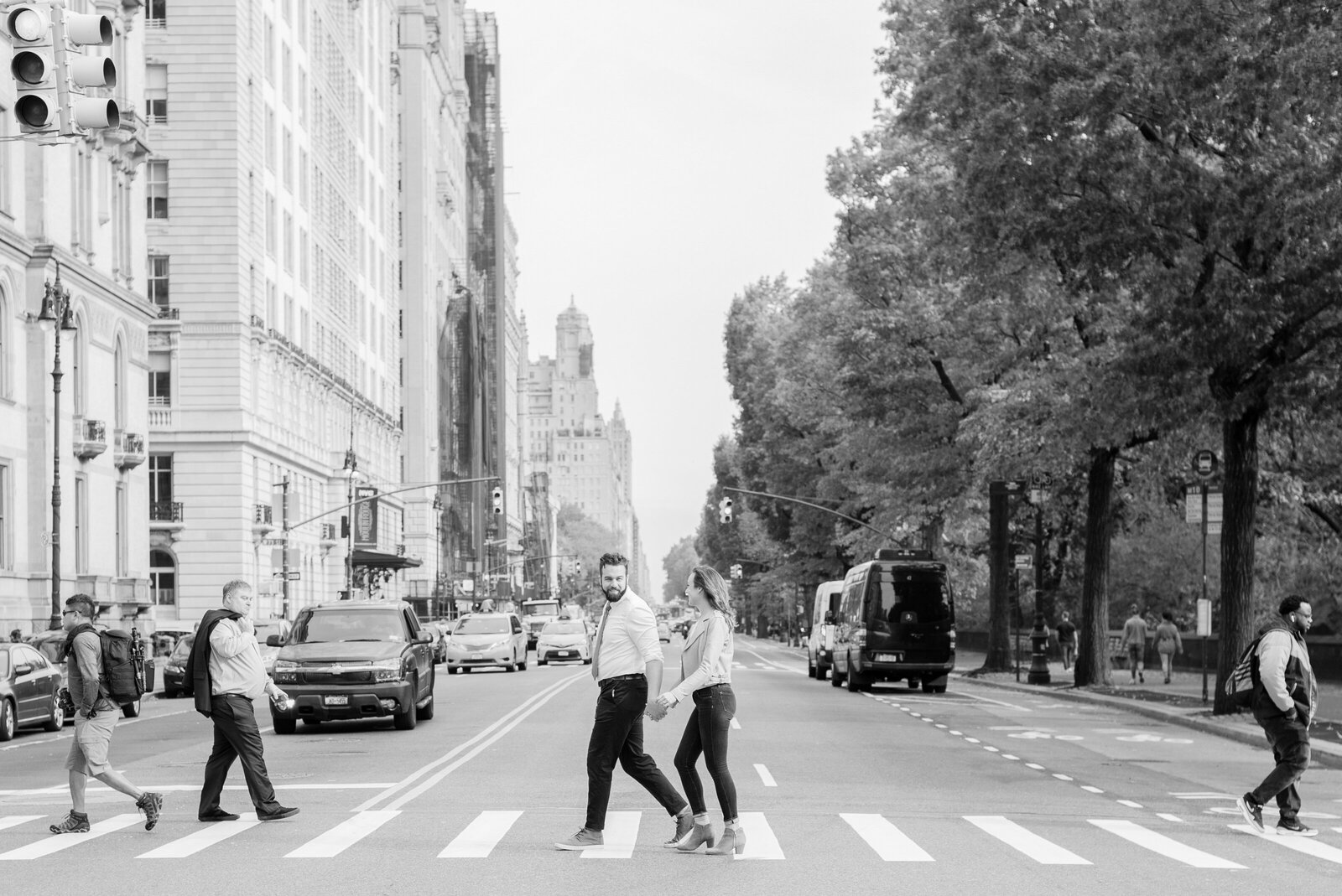 Engaged couple in Central Park engagement photos