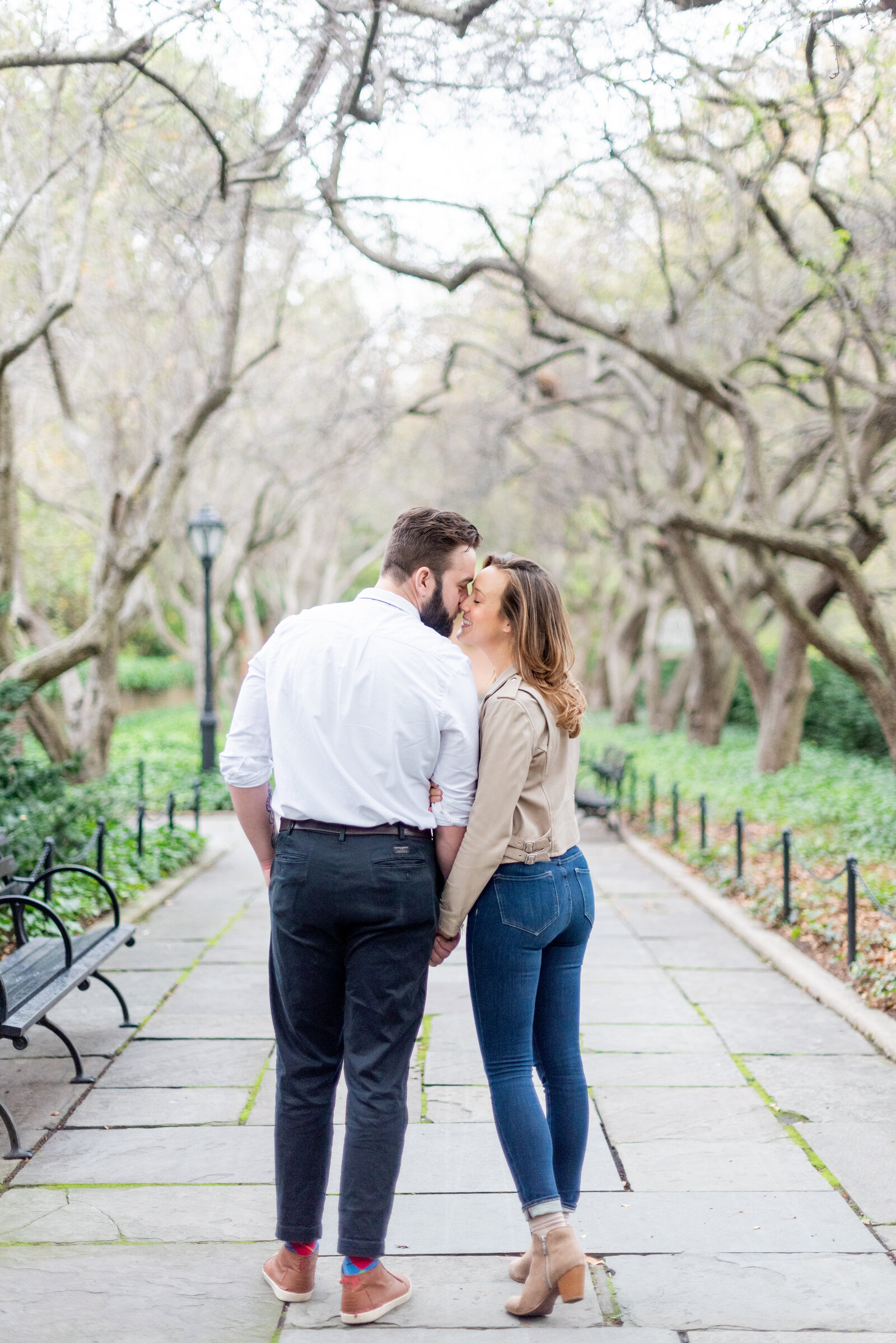 Engaged couple in Central Park engagement photos