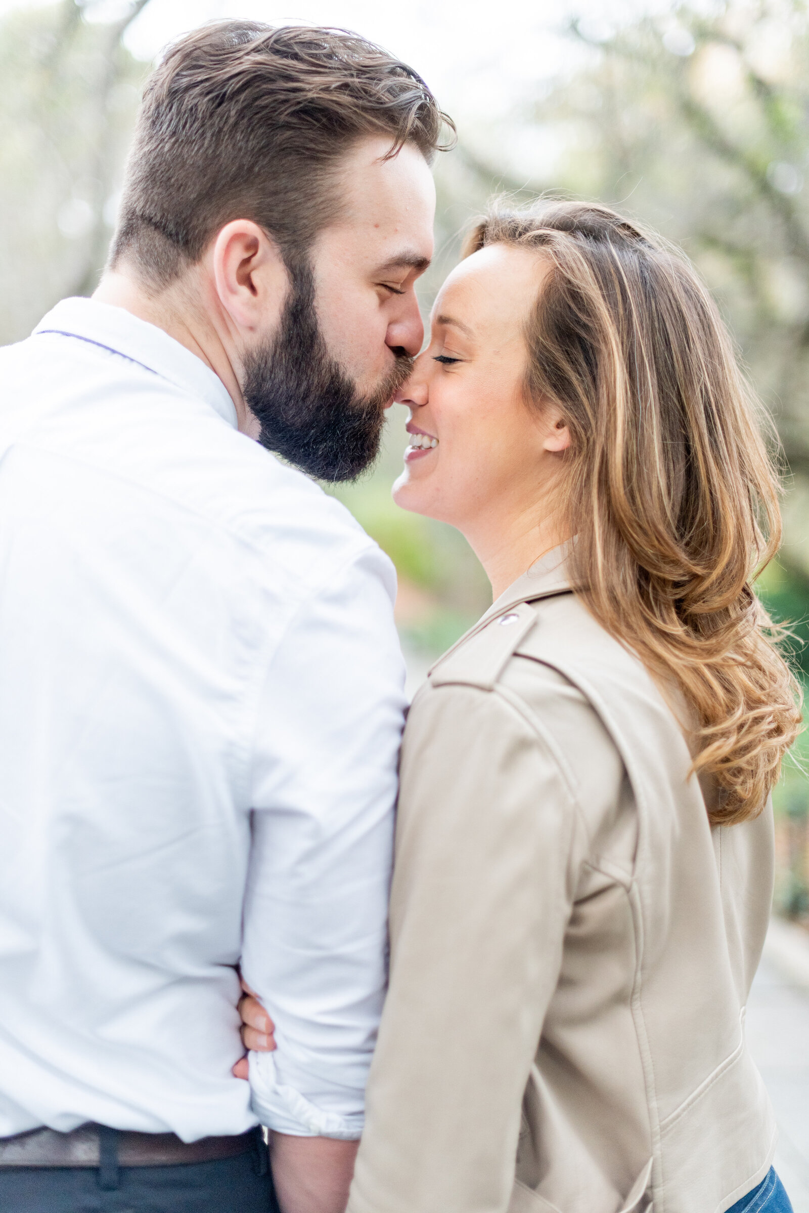 Engaged couple in Central Park engagement photos