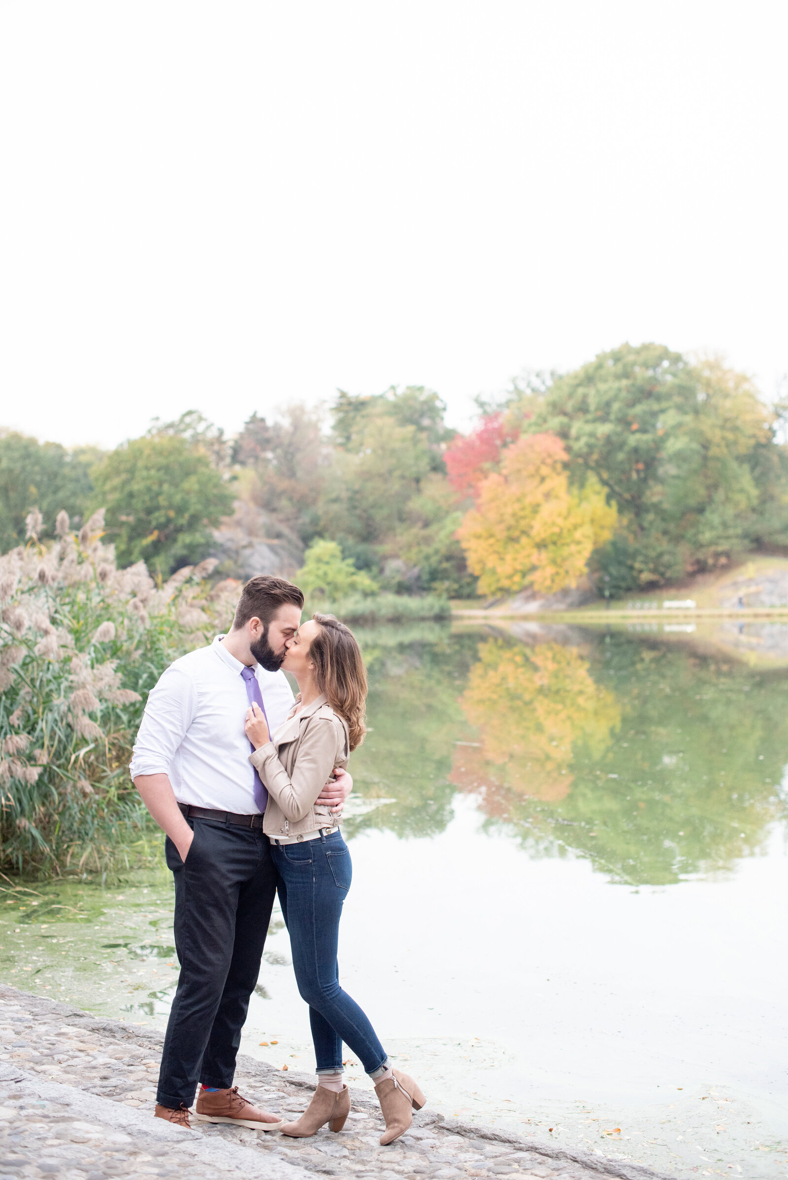 Engaged couple in Central Park engagement photos