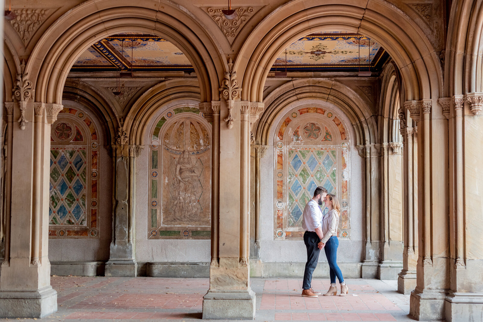 Engaged couple in Central Park engagement photos