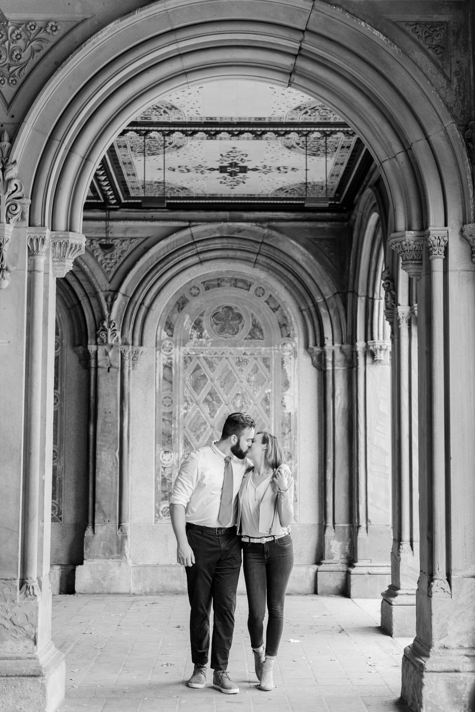 Engaged couple in Central Park engagement photos