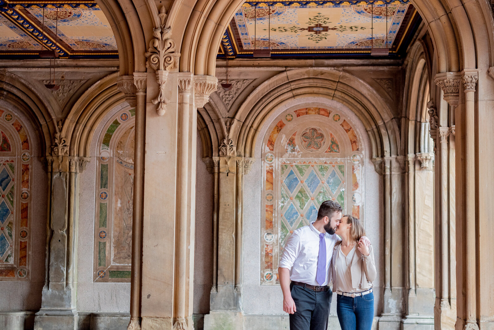 Engaged couple in Central Park engagement photos