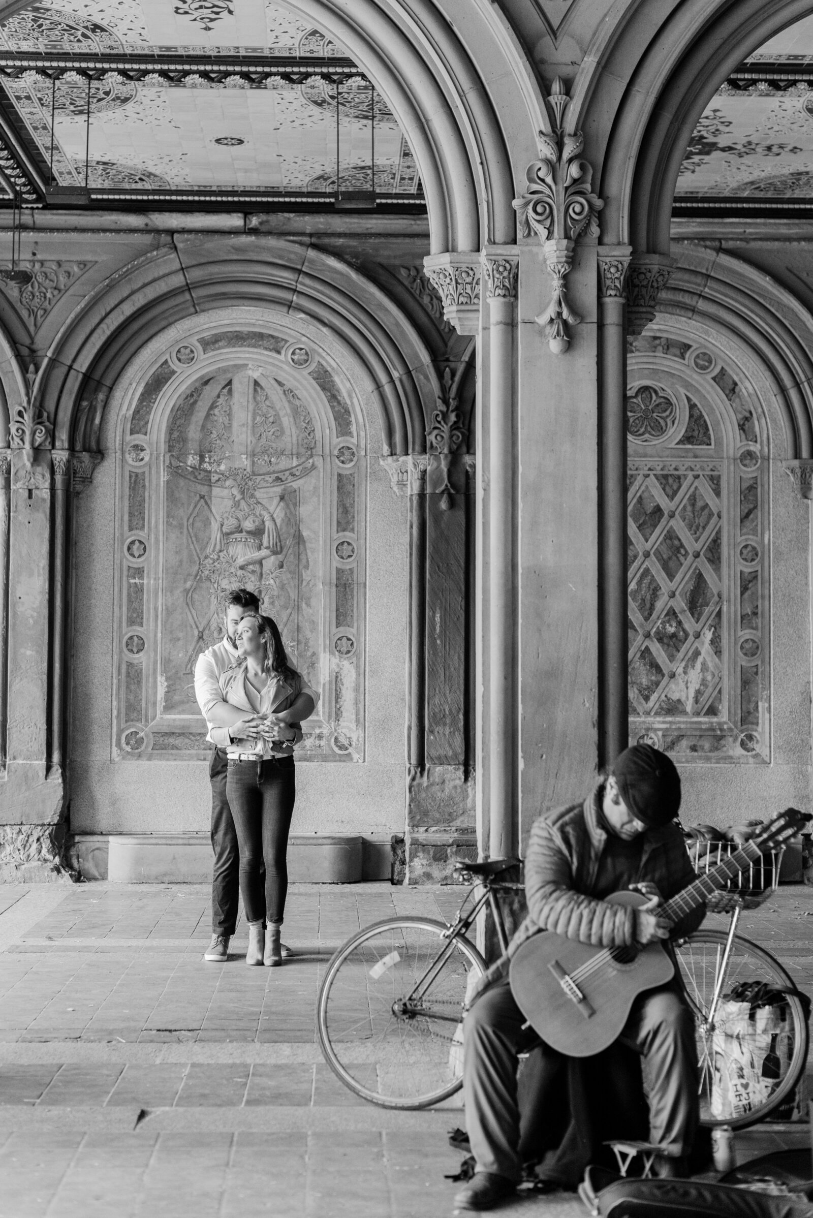 Engaged couple in Central Park engagement photos