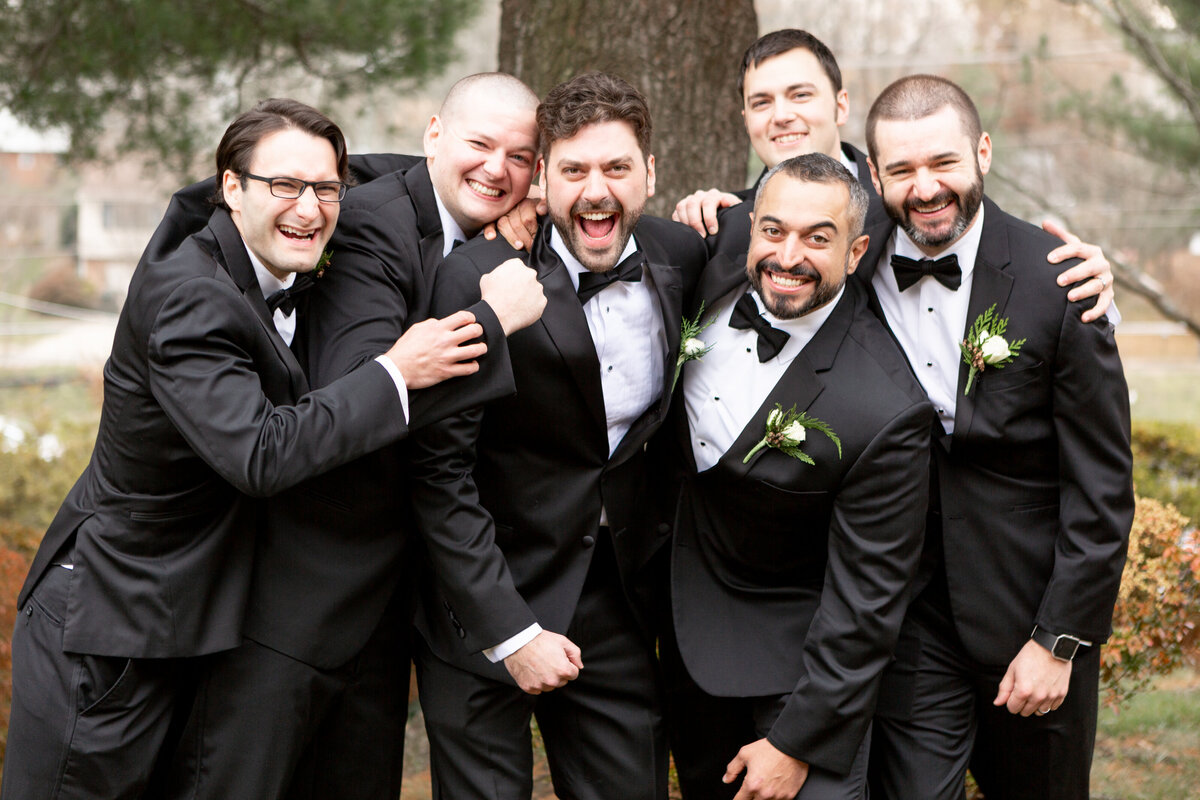 Groom and groomsmen at church before luxury Washington Golf and Country Club Washington DC wedding day