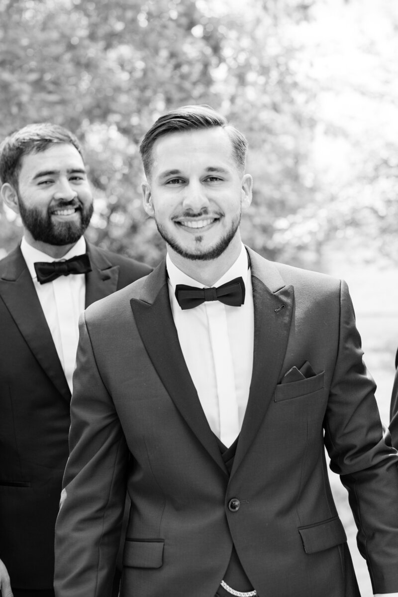 Groom on wedding day with groomsman in Virginia wedding day