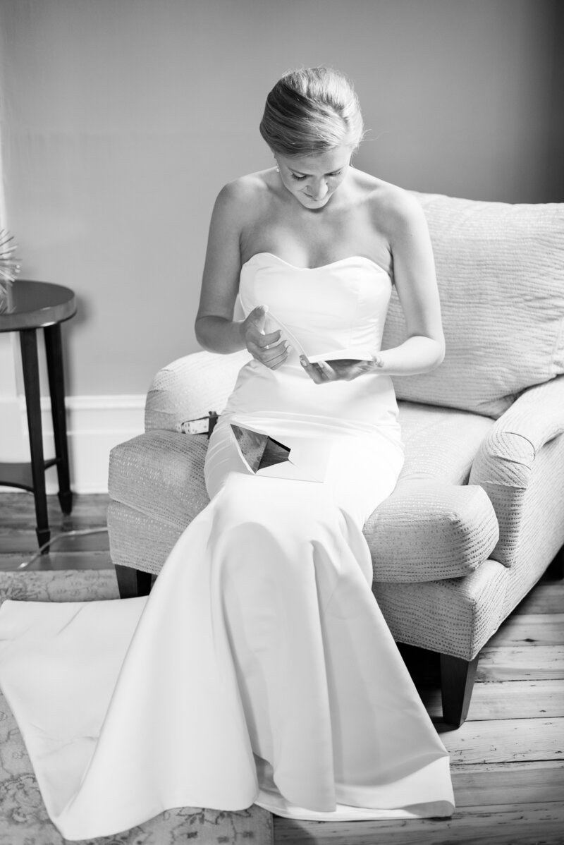 Bride getting ready in wedding dress for luxury Virginia wedding day