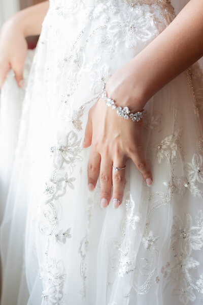 Bride getting ready for catholic wedding and luxury country club wedding for Washington DC wedding day