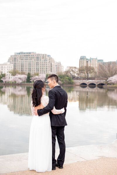 engaged couple at Cherry Blossom Washington DC engagement session