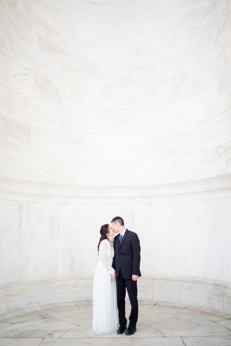 engaged couple at Cherry Blossom Washington DC engagement session